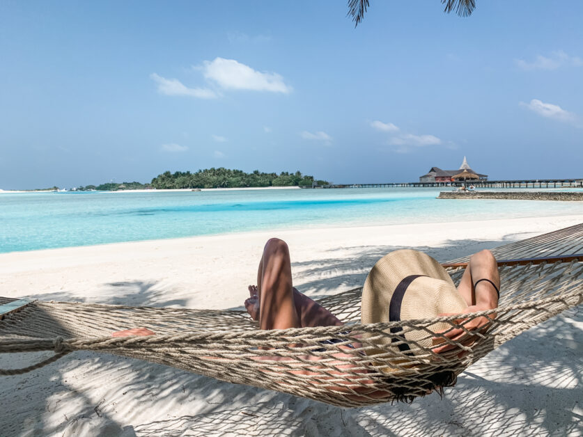 Lindsey in a hammock on the beach at Anantara Veli Maldives